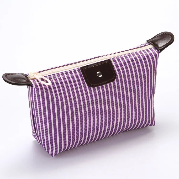 New Women bag Handbags Bag, stylish purple striped pouch with leather accents and zipper closure.